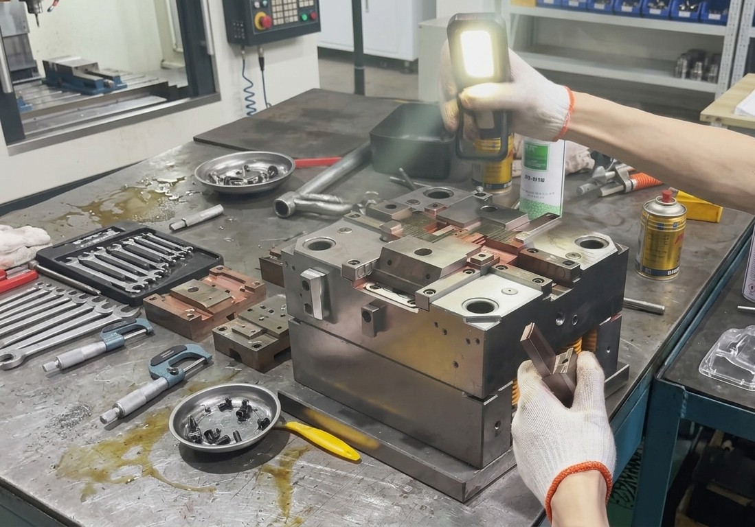Insert molding plastic components with brass threaded inserts